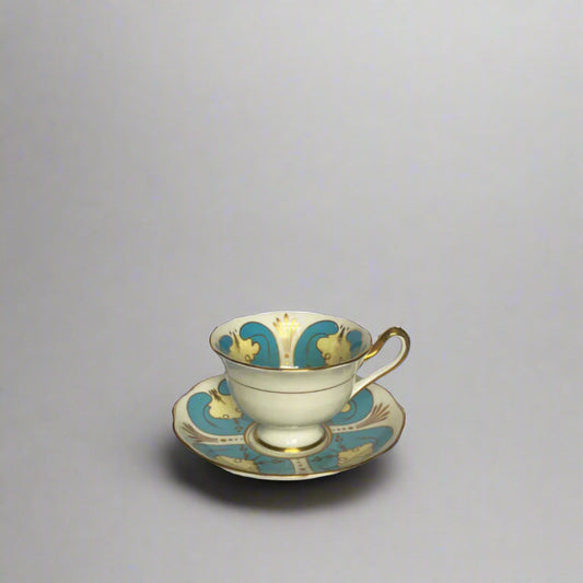 tepluste-Royal Albert front view Blue Art Deco Cup and Saucer