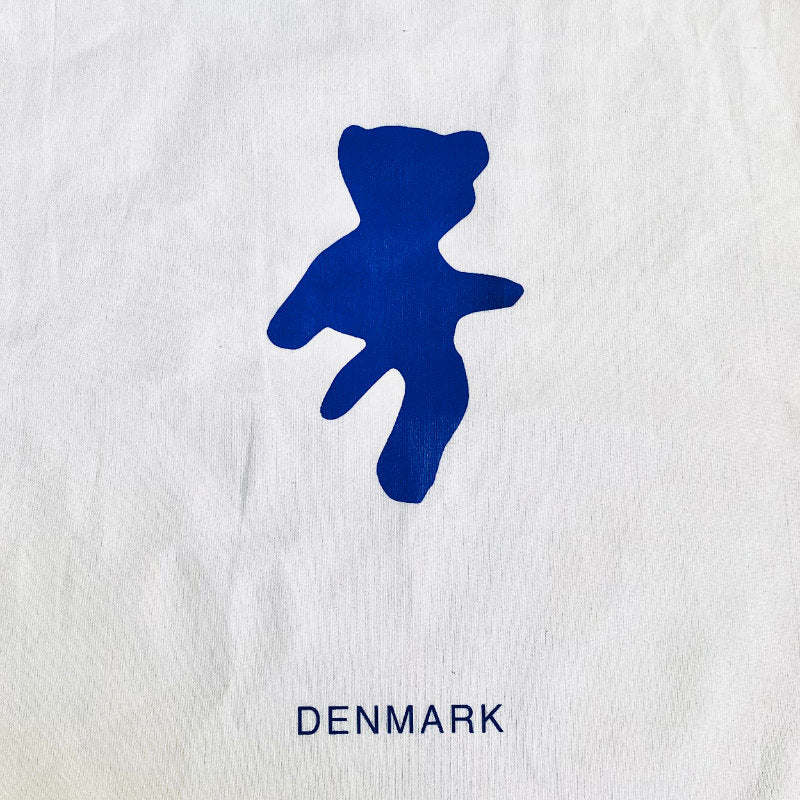 Danish mixed media artist Per Skovgaard's iconic bear tag. White