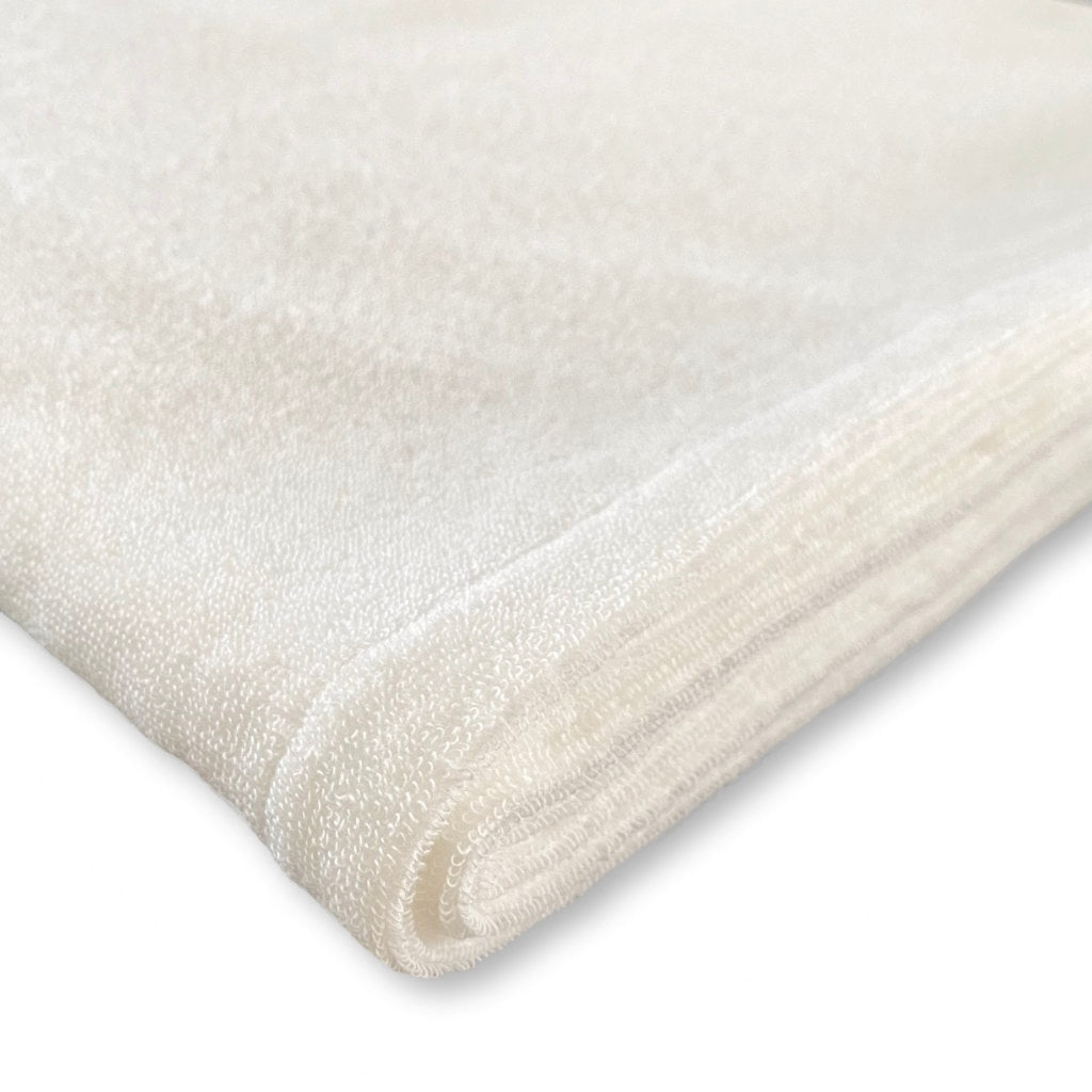 Close-up of a natural white extra large bath towel on a white background-TE PLUS TE