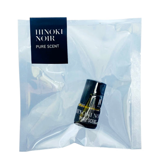 Hinoki Noir Pure Scent packaging with a small bottle on a white background