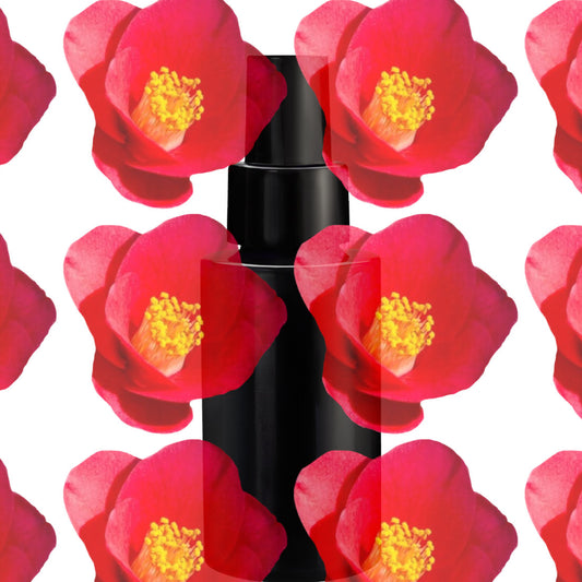 Black cylindrical object with red floral pattern