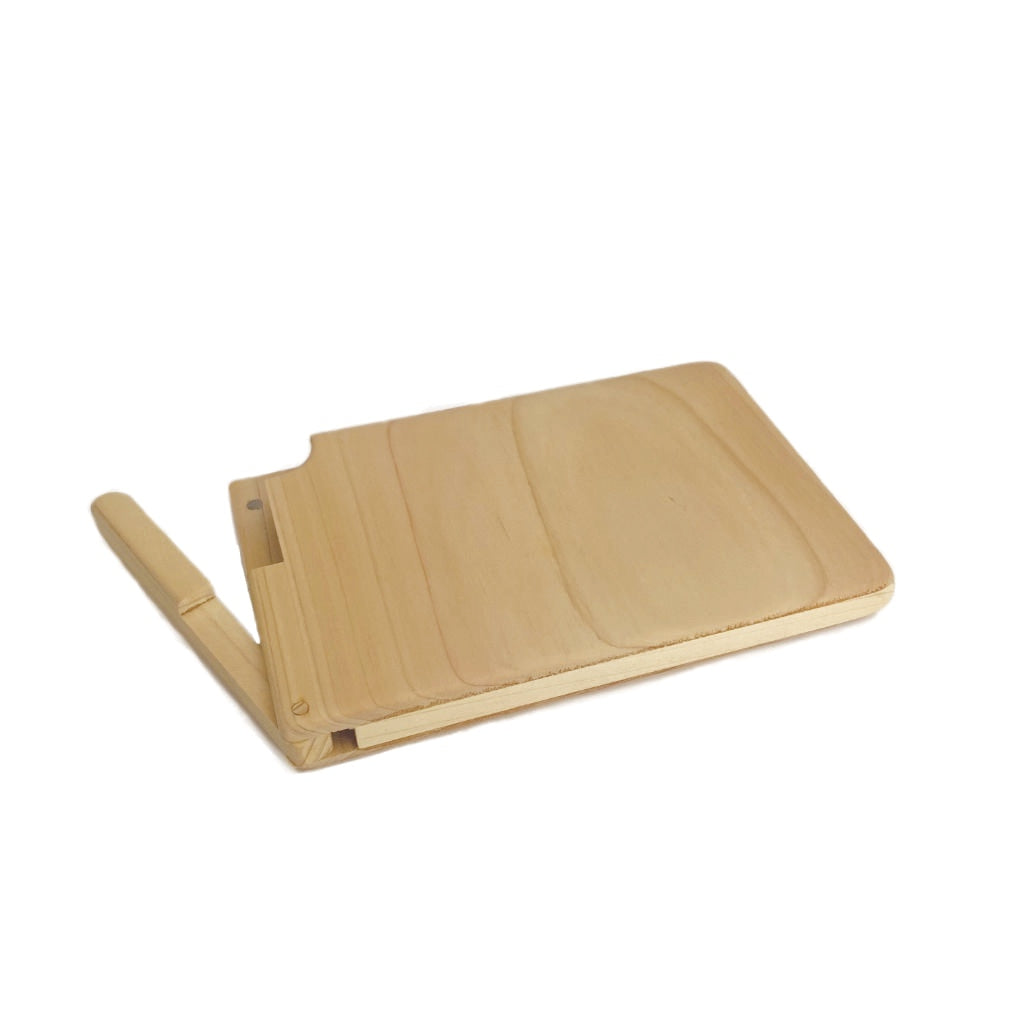 Wooden folding stool on a white background