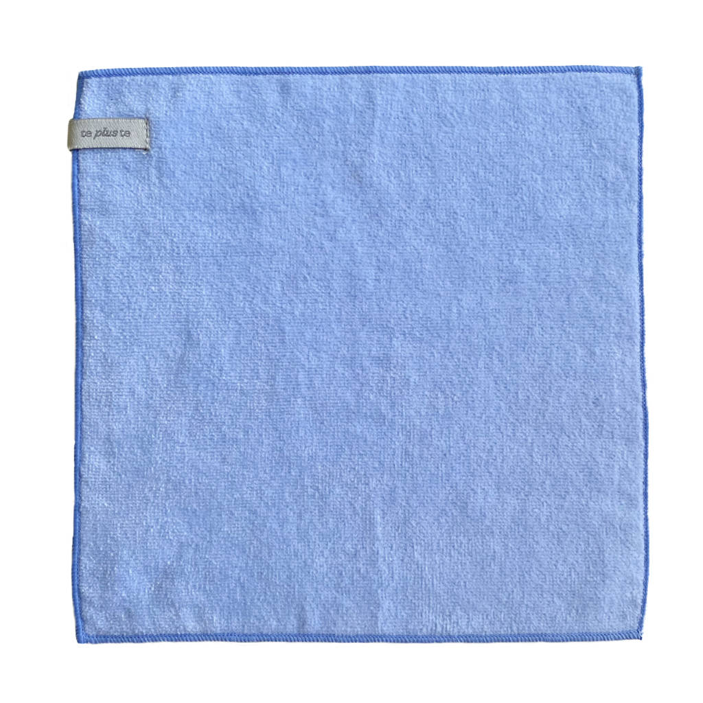 lt blue towel on white backgrouns