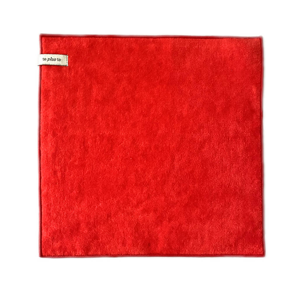 red mini towel on white background