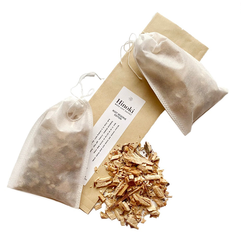 two sachets filled with hinoki  chips showing inside wood chips