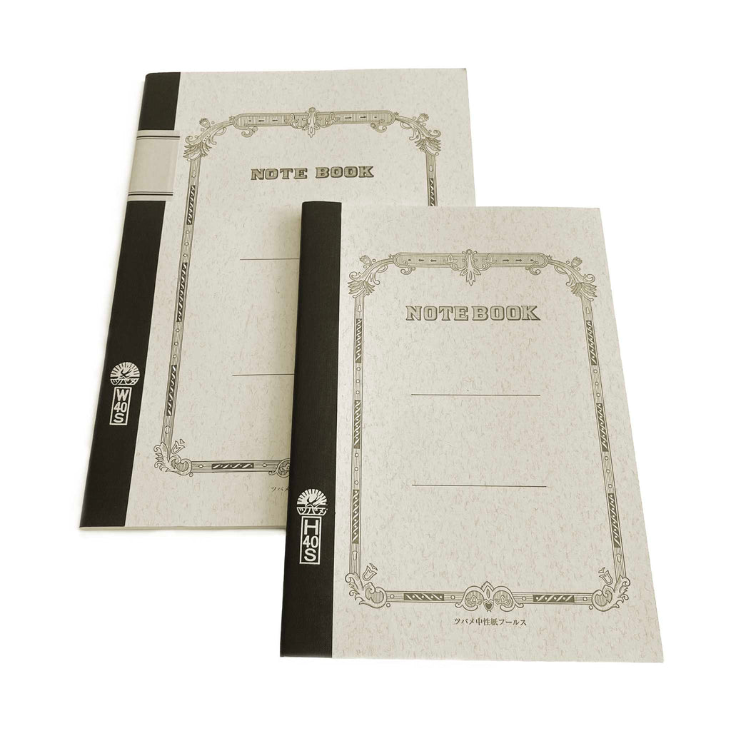 Two notebooks with decorative covers on a white background