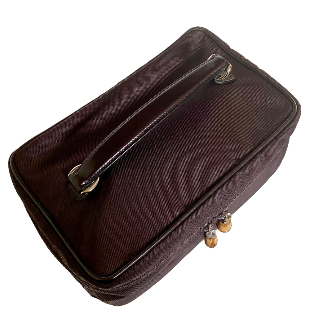 Gucci Bamboo Cosmetic / Vanity Bag  Deep Burgundy canvas and Leather Leather handle Silver-Tone Hardware bamboo Accent Jacquard Lining Zip Closure