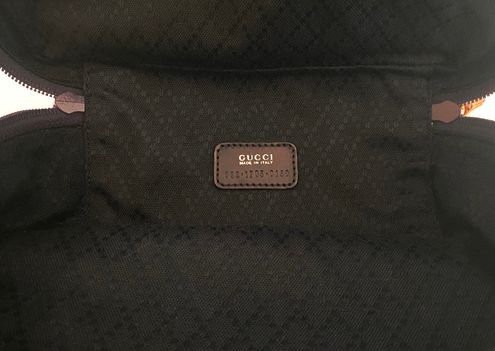 showing the label Inside of Gucci Bamboo Cosmetic / Vanity Bag  Deep Burgundy canvas