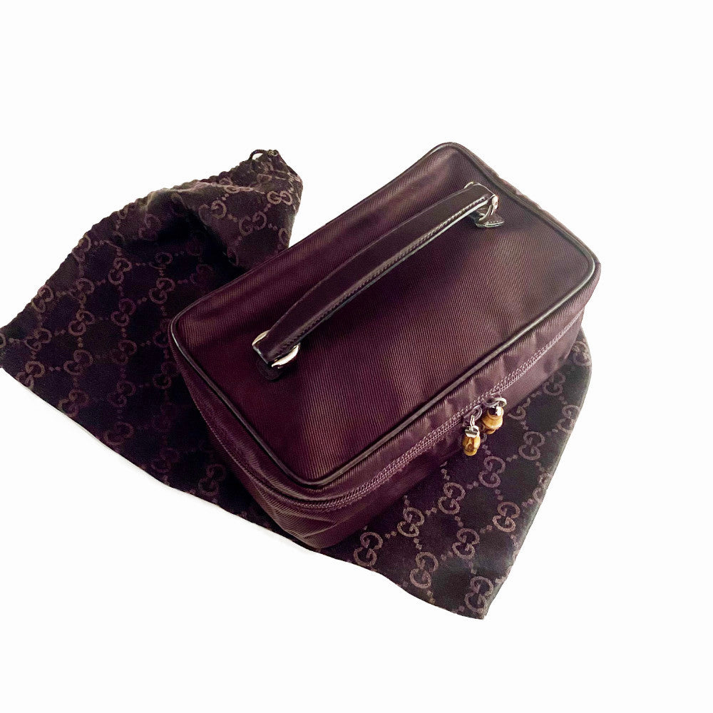 Gucci Bamboo Cosmetic / Vanity Bag  Deep Burgundy canvas and Leather Leather handle Silver-Tone Hardware bamboo Accent Jacquard Lining Zip Closure