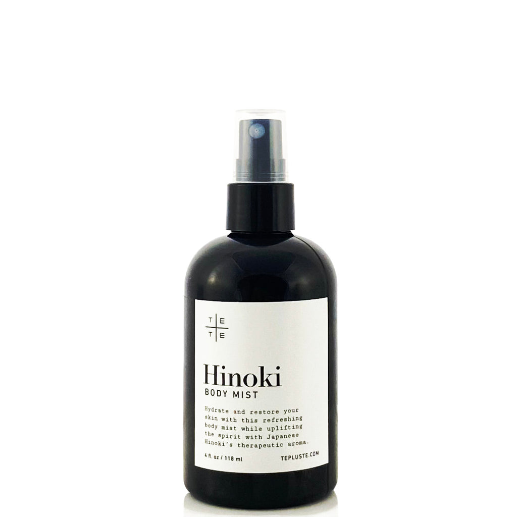 black spray mist bottle with labeled Hinoki Body Mist in white background