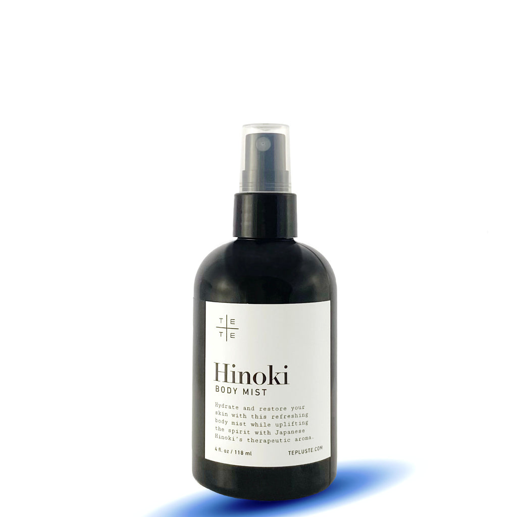 black spray mist bottle with labeled Hinoki Body Mist in white background