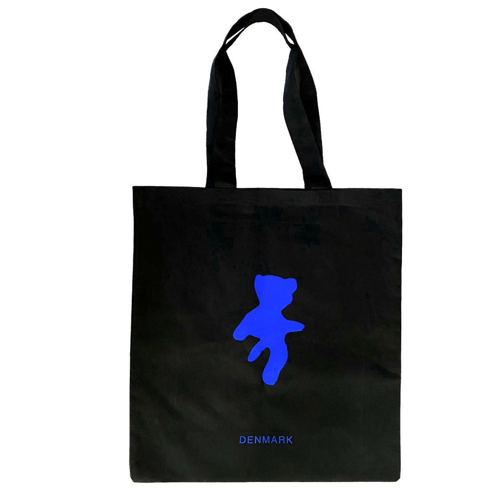 Black tote bag with blue  bear shaped motif designed by Danish mixed media artist Per Skovgaard Based in Copenhagen
