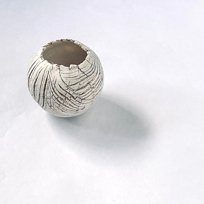 Palm-size porcelain piece, hand-pinched by Eda for Te Plus Te.Keep the day's find in this small vessel.