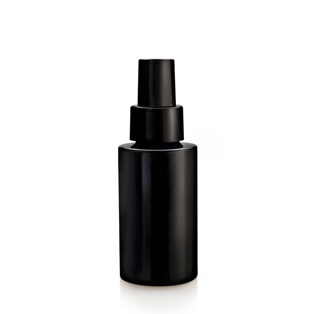 Pure Hinoki Noir Red Essential Body Oil in minimalist black glass bottle — TE PLUS TE