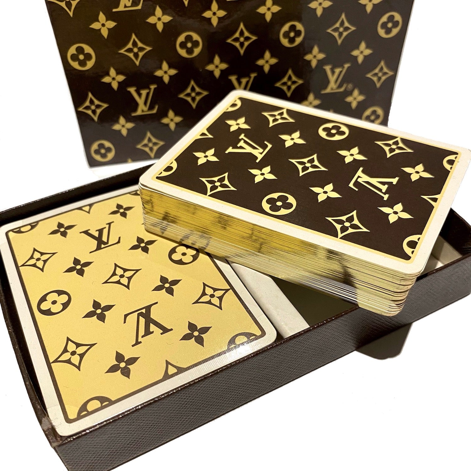 Te Plus Te Two sets of Louis Vuitton vintage playing cards with monogram motif and gilt edges. Includes box and bridge contrat card.