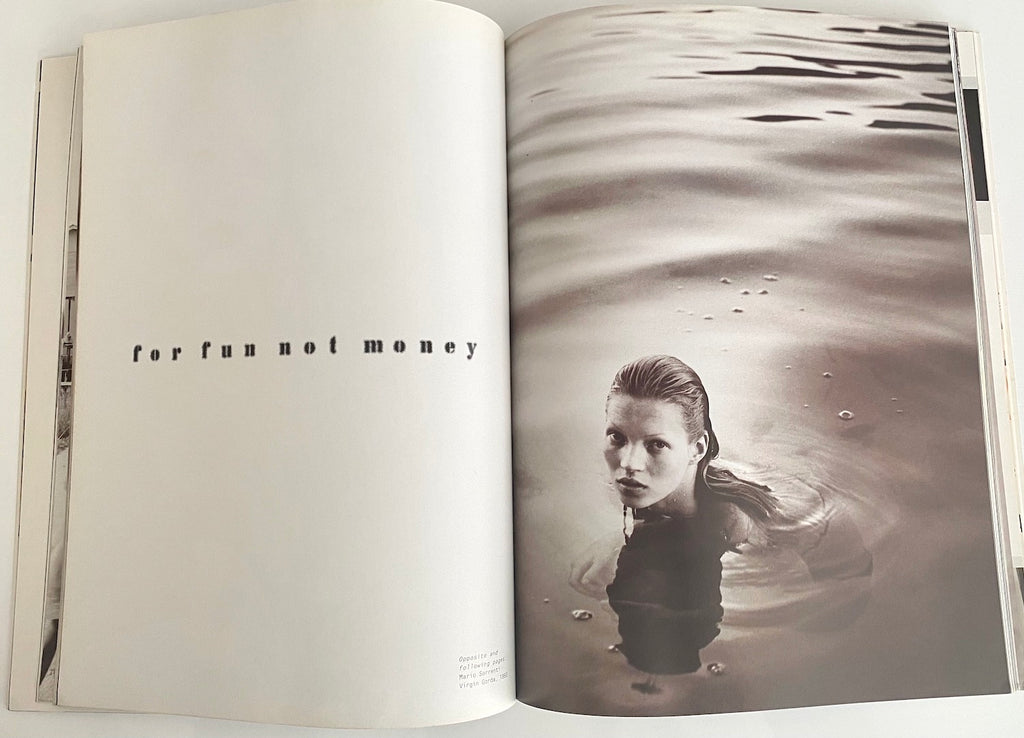 Through Kate's personal selection of her favorite photographs-many never before  published - by Patric Demarchelier, Arthur Elgort, Steven Meisel and Helmut Newton. Te Plus Te Archive.