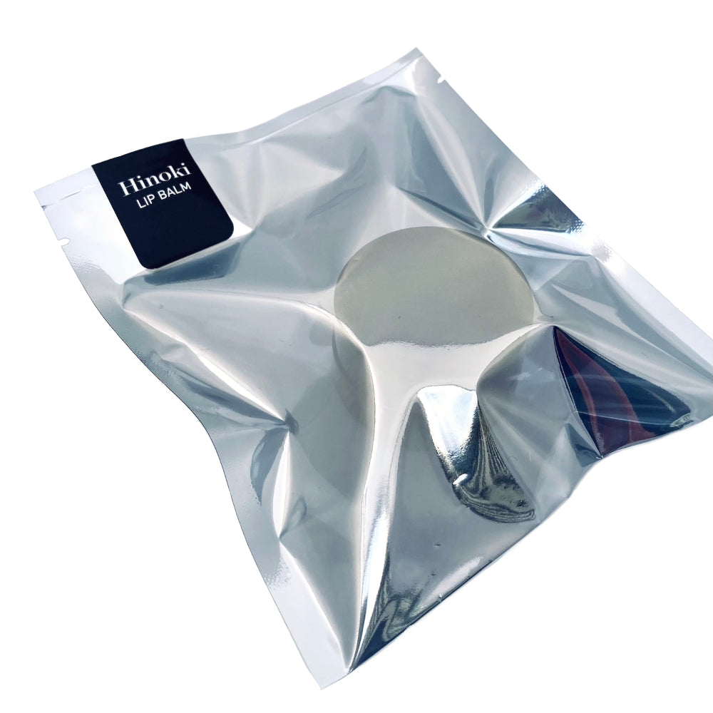 Translucent page with black label Hinoki lip balm of tepluste Hinoki Noir