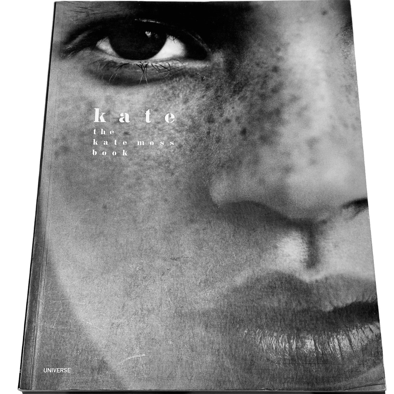 Through Kate's personal selection of her favorite photographs-many never before  published - by Patric Demarchelier, Arthur Elgort, Steven Meisel and Helmut Newton. Te Plus Te Archive.